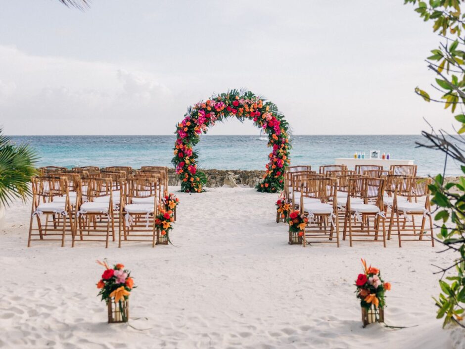Circular-tropical-floral-arch-at-Hyatt-Regency-Aruba-wedding-ceremony-940x705 Wedding Arch Inspiration for Your Dream Wedding in Aruba 